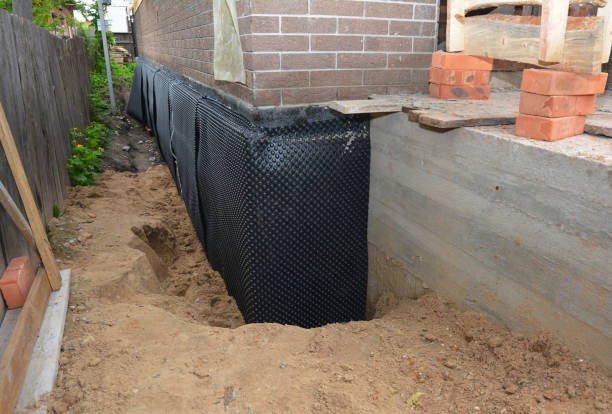 Happy homeowners after waterproofing job in Avondale Estates
